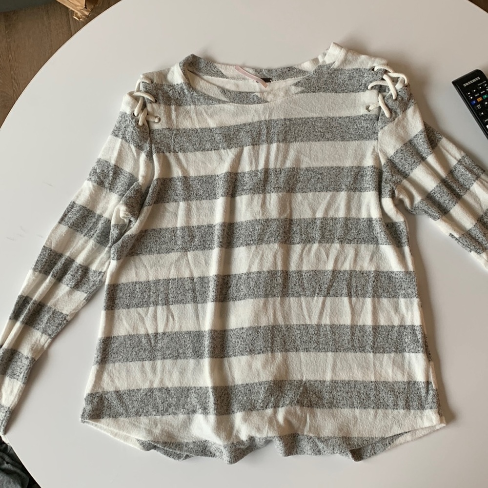 Stitched back and shoulders long sleeve super soft shirt.
